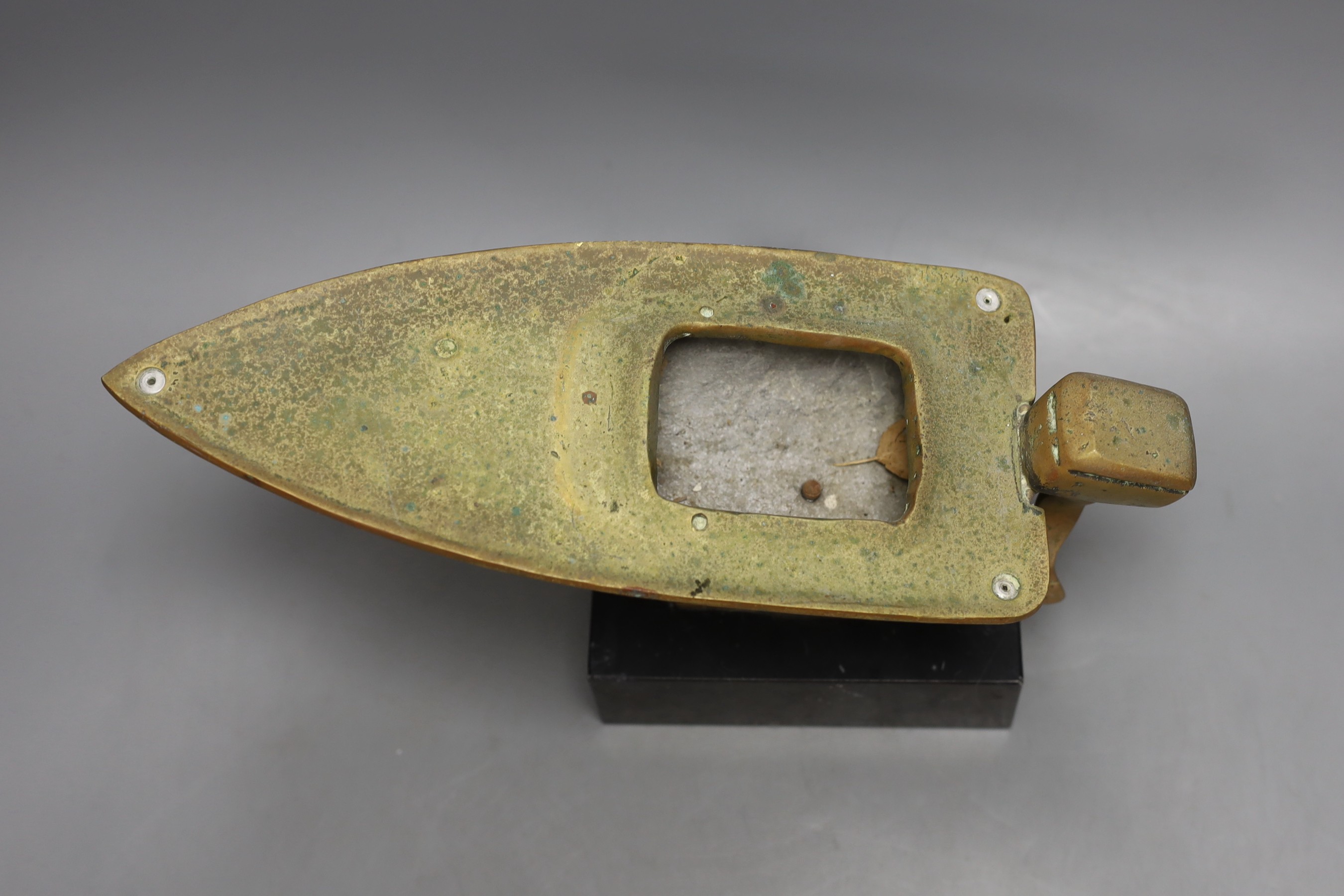 A brass and aluminium model of a speedboat on marble base, 30cm